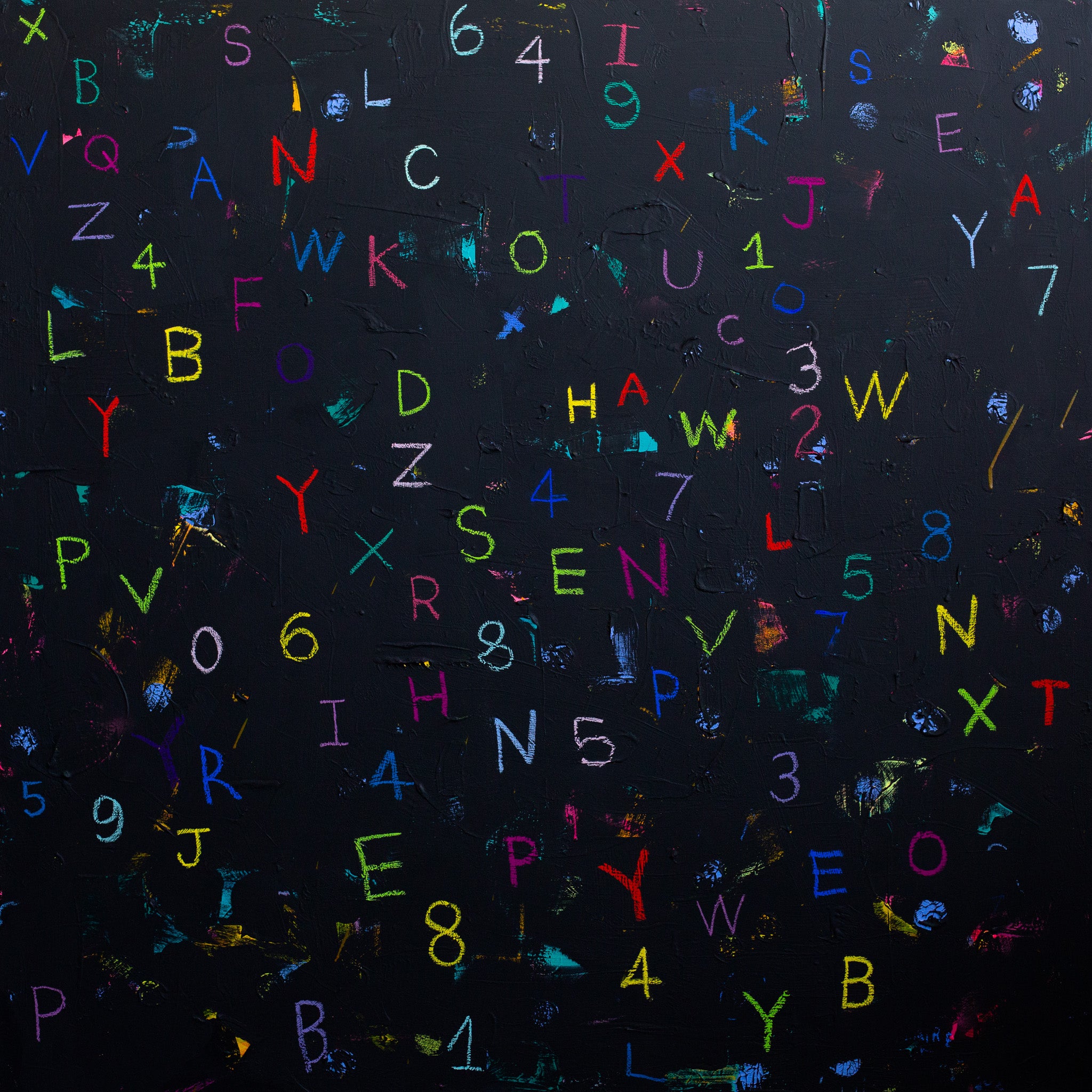 Colorful letters and numbers on a dark textured background